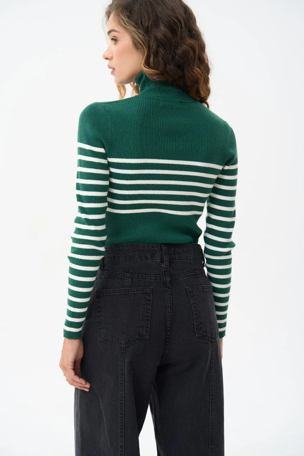 Green turtleneck sweater with a milky stripe