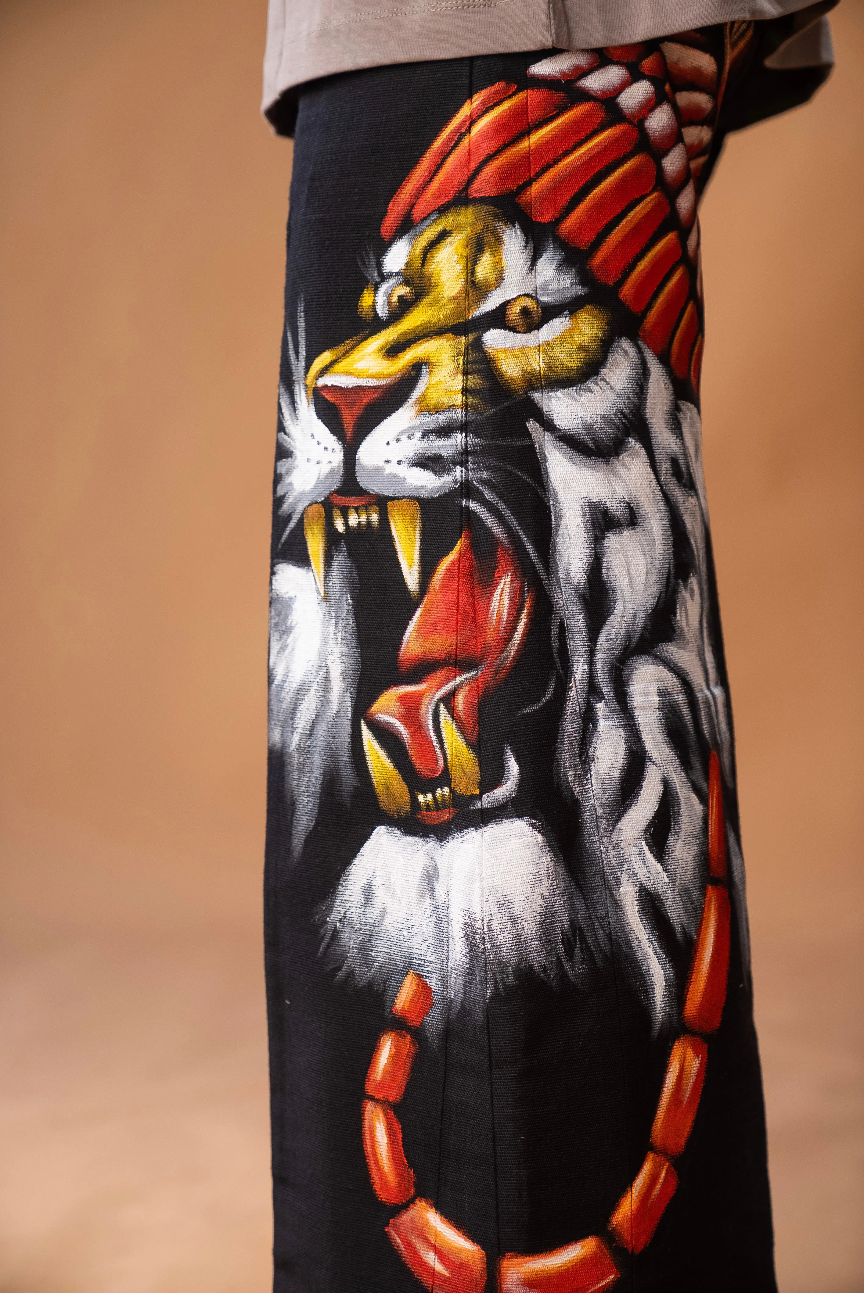 Wide-leg trousers in mixed Aso Oke Ft Hand painted Igbo Lion art